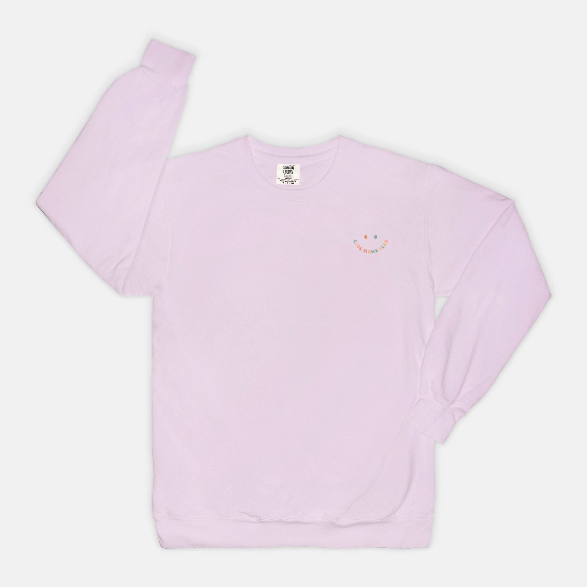 Cool Mom's Club on The back of Graphic Design Pink Crewneck Sweatshirt in Retro Bold Print