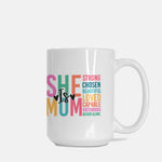 She Is MOM coffee mug on white background. Pastel letter