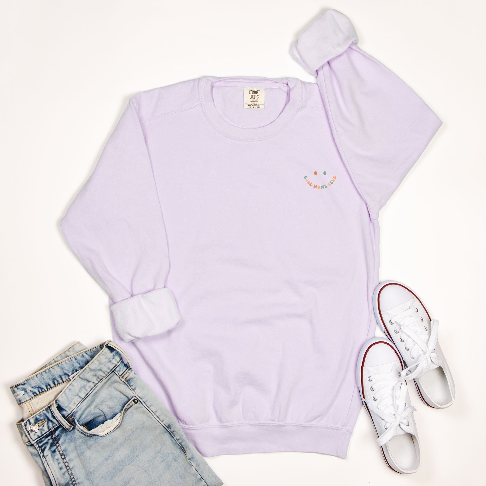COOL MOM'S CLUB LOGO WITH SMILE FACE. On the back in big bold letters COOL MOM'S CLUB